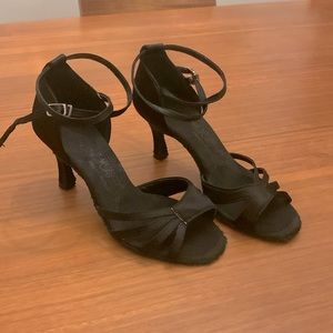 Latin dance heels just under 3 inches. Flexible, suede soles, satin fabric